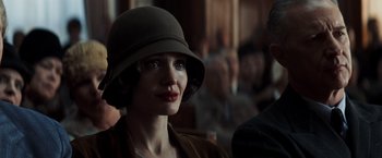 Movie still from “Changeling” (2008), directed by Clint Eastwood – A person wearing a hat; Close Up shot, Over the shoulder angle