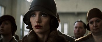 Movie still from “Changeling” (2008), directed by Clint Eastwood – A person wearing a hat; Close Up shot, Low angle