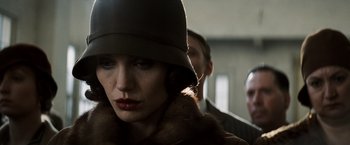 Movie still from “Changeling” (2008), directed by Clint Eastwood – A person wearing a hat; Close Up shot, Low angle