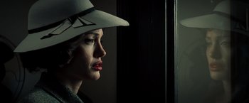 Movie still from “Changeling” (2008), directed by Clint Eastwood – A person wearing a hat; Close Up shot, Low angle