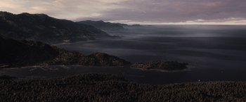 Movie still from “Charlie St. Cloud” (2010), directed by Burr Steers – A view of a body of water and mountains in the distance; Extreme Wide shot, High angle