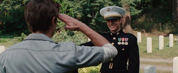 Movie still from “Charlie St. Cloud” (2010), directed by Burr Steers – A man saluting another man in a uniform; Medium shot, Over the shoulder angle
