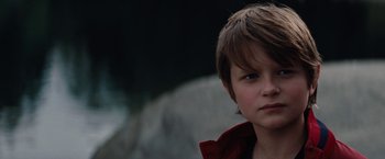 Movie still from “Charlie St. Cloud” (2010), directed by Burr Steers – A young boy is looking at the camera; Close Up shot, Low angle