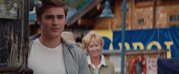 Movie still from “Charlie St. Cloud” (2010), directed by Burr Steers – A man and a woman walking down a street; Medium shot, Over the shoulder angle