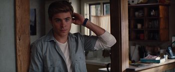 Movie still from “Charlie St. Cloud” (2010), directed by Burr Steers – A young man is standing in front of a mirror; Close Up shot, Over the shoulder angle