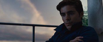 Movie still from “Charlie St. Cloud” (2010), directed by Burr Steers – A person sitting on a bench; Close Up shot, Over the shoulder angle