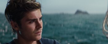 Movie still from “Charlie St. Cloud” (2010), directed by Burr Steers – A person looking at the ocean; Close Up shot, Over the shoulder angle