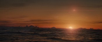 Movie still from “Charlie St. Cloud” (2010), directed by Burr Steers – The sun is setting over a body of water; Extreme Wide shot, Low angle