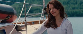 Movie still from “Charlie St. Cloud” (2010), directed by Burr Steers – A woman in a white shirt is standing on a boat; Close Up shot, Over the shoulder angle