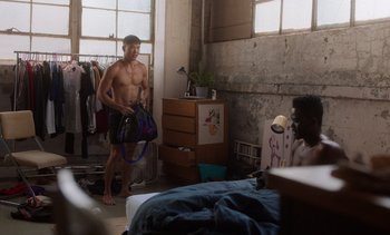 Movie still from “Fire Island” (2022), directed by Andrew Ahn – Wide shot, Over the shoulder angle