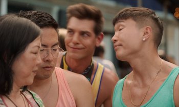 Movie still from “Fire Island” (2022), directed by Andrew Ahn – Close Up shot, Over the shoulder angle