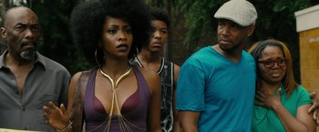 Movie still from “Chi-Raq” (2015), directed by Spike Lee – A group of people standing next to each other; Close Up shot, Over the shoulder angle