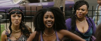 Movie still from “Chi-Raq” (2015), directed by Spike Lee – A beautiful young woman with very long black hair; Close Up shot, Over the shoulder angle