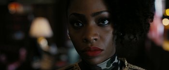 Movie still from “Chi-Raq” (2015), directed by Spike Lee – A person wearing a camouflage shirt; Close Up shot, Low angle