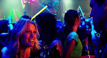 Movie still from “Chronicle” (2012), directed by Josh Trank – A group of young people in a room with neon lights; Close Up shot, Over the shoulder angle