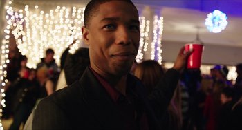 Movie still from “Chronicle” (2012), directed by Josh Trank – A person wearing a suit and tie; Close Up shot, Over the shoulder angle