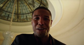 Movie still from “Chronicle” (2012), directed by Josh Trank – A person smiling for the camera; Close Up shot, Low angle