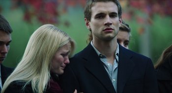 Movie still from “Chronicle” (2012), directed by Josh Trank – A man and a woman standing next to each other; Close Up shot, Over the shoulder angle
