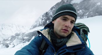 Movie still from “Chronicle” (2012), directed by Josh Trank – A person wearing a jacket and a hat; Close Up shot, Low angle