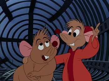 Movie still from “Cinderella” (1950), directed by Hamilton Luske – A couple of cartoon mice are standing next to each other; Medium shot, Over the shoulder angle
