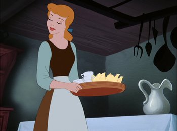 Movie still from “Cinderella” (1950), directed by Hamilton Luske – A woman holding a tray with food on top of it; Medium shot, Low angle