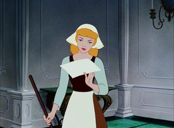 Movie still from “Cinderella” (1950), directed by Hamilton Luske – A cartoon of a woman holding a paper and a broom; Medium shot, High angle