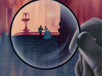 Movie still from “Cinderella” (1950), directed by Hamilton Luske – A reflection of a princess and a prince in a mirror; Wide shot, High angle