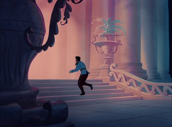 Movie still from “Cinderella” (1950), directed by Hamilton Luske – A man running down the steps of a building; Extreme Wide shot, High angle