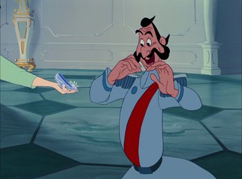 Movie still from “Cinderella” (1950), directed by Hamilton Luske – A man in a suit and a red and white tie; Medium shot, Over the shoulder angle