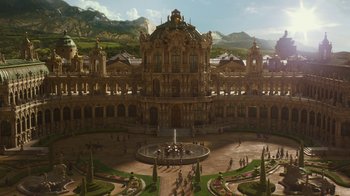 Movie still from “Cinderella” (2015), directed by Kenneth Branagh – A large building with a fountain in the middle of it; Extreme Wide shot, High angle