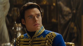 Movie still from “Cinderella” (2015), directed by Kenneth Branagh – A person wearing a suit and tie; Close Up shot, Low angle