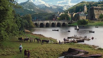 Movie still from “Cinderella” (2015), directed by Kenneth Branagh – A group of people standing on top of a grass covered field; Extreme Wide shot, High angle