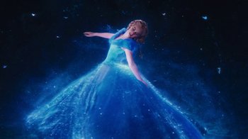 Movie still from “Cinderella” (2015), directed by Kenneth Branagh – A woman in a blue dress floating in the air; Wide shot, Overhead angle