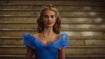 Movie still from “Cinderella” (2015), directed by Kenneth Branagh – A beautiful young lady in a blue dress; Close Up shot, Low angle