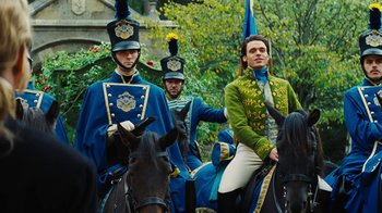 Movie still from “Cinderella” (2015), directed by Kenneth Branagh – A group of men riding on the backs of horses; Medium shot, Low angle