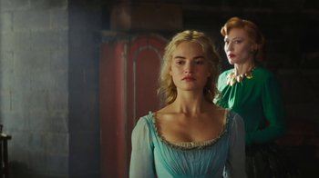 Movie still from “Cinderella” (2015), directed by Kenneth Branagh – Two women standing next to each other in a room; Medium shot, Over the shoulder angle