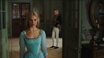 Movie still from “Cinderella” (2015), directed by Kenneth Branagh – A man and a woman standing in front of a door; Medium shot, Over the shoulder angle