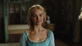 Movie still from “Cinderella” (2015), directed by Kenneth Branagh – A beautiful young lady wearing a blue dress; Close Up shot, Over the shoulder angle