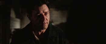 Movie still from “Cinderella Man” (2005), directed by Ron Howard – A person wearing a jacket; Close Up shot, Over the shoulder angle