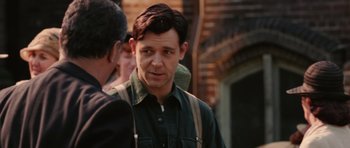 Movie still from “Cinderella Man” (2005), directed by Ron Howard – A person talking to another person; Close Up shot, Over the shoulder angle