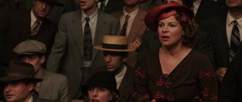 Movie still from “Cinderella Man” (2005), directed by Ron Howard – A group of men and women wearing hats and suits; Close Up shot, High angle