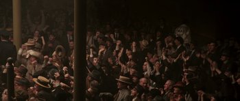 Movie still from “Cinderella Man” (2005), directed by Ron Howard – A crowd of people sitting in a stadium; Extreme Wide shot, High angle