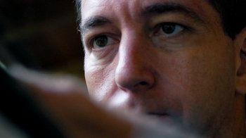 Movie still from “Citizenfour” (2014), directed by Laura Poitras – A man's face with a cigarette in his mouth; Extreme Close Up shot, Low angle