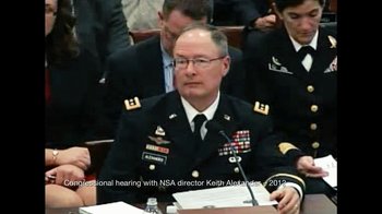 Movie still from “Citizenfour” (2014), directed by Laura Poitras – A man in military uniform sitting in front of a group of people; Close Up shot, Over the shoulder angle