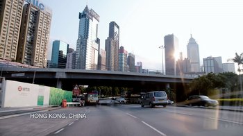 Movie still from “Citizenfour” (2014), directed by Laura Poitras – Cars are driving on a highway under a bridge; Extreme Wide shot, Low angle