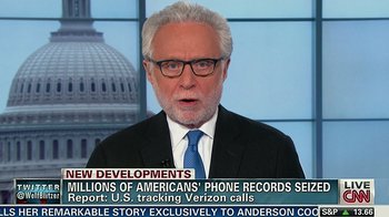 Movie still from “Citizenfour” (2014), directed by Laura Poitras – An older man in a suit and tie; Close Up shot, Low angle