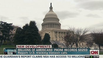 Movie still from “Citizenfour” (2014), directed by Laura Poitras – A large building with the capitol building in the background; Extreme Wide shot, Low angle