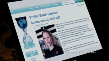 Movie still from “Citizenfour” (2014), directed by Laura Poitras – A computer screen showing a profile page of a woman; Extreme Close Up shot, Over the shoulder angle