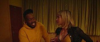 Movie still from “Climax” (2018), directed by Gaspar Noé – A man and a woman are talking to each other; Medium shot, Over the shoulder angle