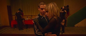 Movie still from “Climax” (2018), directed by Gaspar Noé – A man and a woman dancing together in a room; Medium shot, Low angle